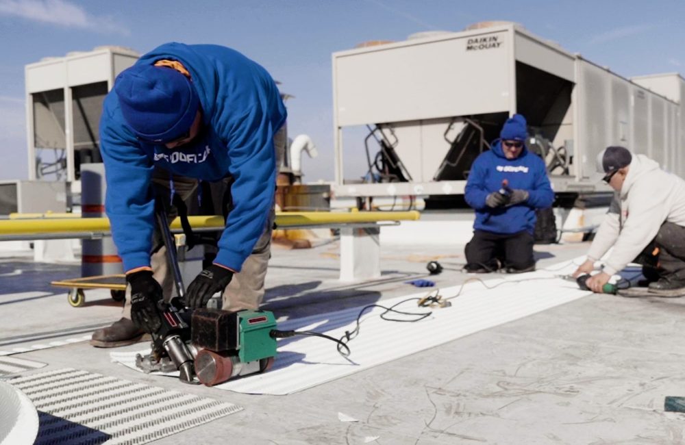 NIR Roof Care Specialists performing maintenance services